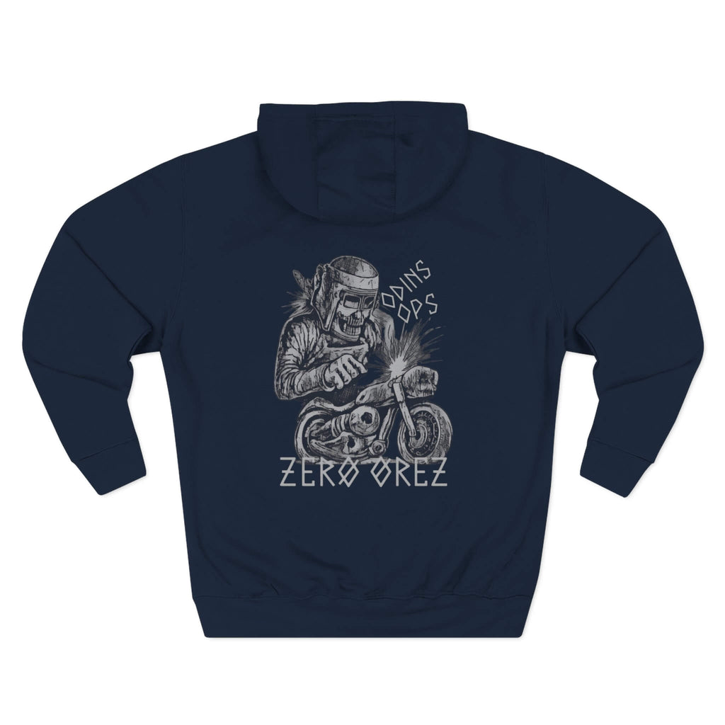 Navy blue hoodie with graphic design of a skeleton on a motorcycle and text Zero Orez' on a white background bone mechanic | COMIGO CLOTHING CO.